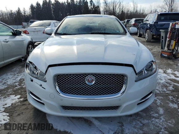 2015 Jaguar XJ Portfolio z VIN SAJWJ2GD5F8V77355, wystawiony jako Copart lot #47214835 z przebiegiem 73 202 mil mil oraz Szkoda całkowita • Salvage title. Historia ofert i sprzedaży dostępna na DreamBid. Obrazek 5.
