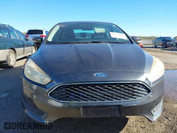 2016 Ford Focus SE z VIN 1FADP3F27GL321507, wystawiony jako IAAI lot #41278203 z przebiegiem 157 910 mil mil oraz . Historia ofert i sprzedaży dostępna na DreamBid. Obrazek 12.
