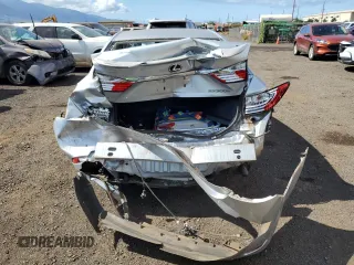 2013 Lexus ES 300h with VIN JTHBW1GG3D2004262, listed as a Copart auction lot 52290995 with 70,565 mi miles and Salvage title. Bid and sale history available at DreamBid. Image 6.