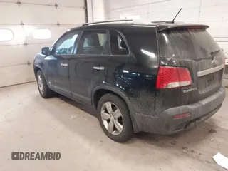 2013 Kia Sorento EX with VIN 5XYKUDA63DG410184, listed as a IAAI auction lot 41416399 with 214,623 mi miles. Bid and sale history available at carsss.com. Image 3.