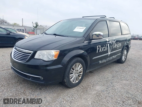 2013 Chrysler Town & Country Limited with VIN 2C4RC1GG2DR595808, listed as a IAAI auction lot 41946685 with 185,579 mi miles. Bid and sale history available at carsss.com. Image 2.