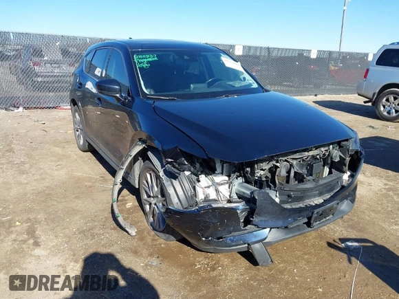 2019 Mazda CX-5 Grand Touring with VIN JM3KFBDM2K1685168, listed as a IAAI auction lot 41323598 with 88,429 mi miles. Bid and sale history available at carsss.com. Image 1.