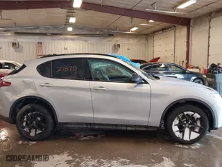 2020 Alfa Romeo Stelvio Sport with VIN ZASPAKAN7L7C97725, listed as a IAAI auction lot 41627878 with 43,523 mi miles. Bid and sale history available at carsss.com. Image 13.