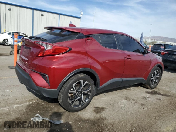 2019 Toyota C-HR XLE with VIN JTNKHMBX5K1048945, listed as a Copart auction lot 50242345 with 44,252 mi miles and Salvage Title. Bid and sale history available at DreamBid. Image 3.