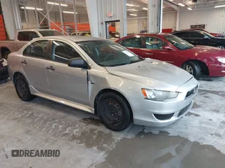2010 Mitsubishi Lancer DE with VIN JA32U1FU3AU019390, listed as a IAAI auction lot 39876469 with 188,617 mi miles. Bid and sale history available at carsss.com. Image 1.