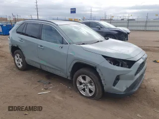 2020 Toyota RAV4 Hybrid XLE with VIN 2T3RWRFV2LW057300, listed as a Copart auction lot 54762655 with 96,624 mi miles and Salvage title. Bid and sale history available at DreamBid. Image 4.