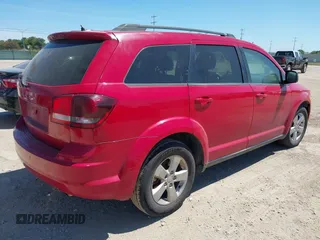 2013 Dodge Journey SE with VIN 3C4PDCAB1DT555181, listed as a IAAI auction lot 42834864 with 152,615 mi miles and . Bid and sale history available at DreamBid. Image 4.