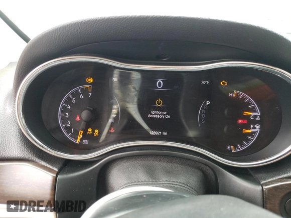 2014 Jeep Grand Cherokee Limited z VIN 1C4RJFBG7EC546642, wystawiony jako Copart lot #61445615 z przebiegiem 128 921 mil mil oraz Szkoda całkowita • Salvage title. Historia ofert i sprzedaży dostępna na DreamBid. Obrazek 9.