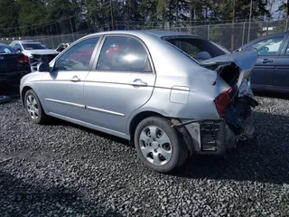 2007 Kia Spectra EX with VIN KNAFE121375453966, listed as a IAAI auction lot 41775758 with 211,586 mi miles. Bid and sale history available at carsss.com. Image 3.