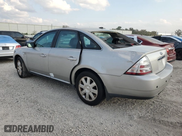 2008 Ford Taurus Limited with VIN 1FAHP28W38G117020, listed as a Copart auction lot 76197234 with 112,027 mi miles and Salvage Title. Bid and sale history available at carsss.com. Image 2.