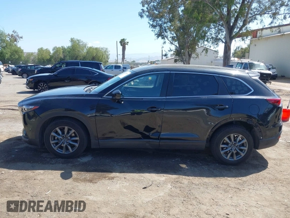 2020 Mazda CX-9 Sport with VIN JM3TCABY8L0407430, listed as a IAAI auction lot 42288490 with 50,317 mi miles and . Bid and sale history available at DreamBid. Image 14.