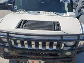 2003 Hummer H2 с VIN 5GRGN23U53H111741, выставлен на аукционе Copart как лот 50411495 с пробегом Не указан миль и Списание • Salvage title. История ставок и продаж доступна на DreamBid. Изображение 14.