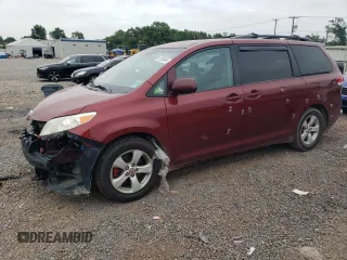 2011 Toyota Sienna LE AAS with VIN 5TDKK3DC5BS121227, listed as a Copart auction lot 61780495 with 186,564 mi miles and Salvage title. Bid and sale history available at DreamBid. Image 1.