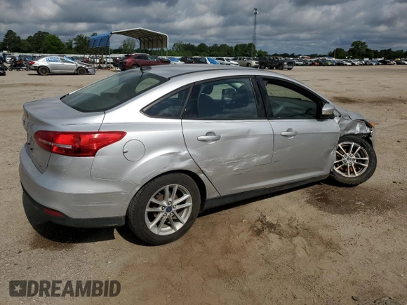 2017 Ford Focus SE with VIN 1FADP3F23HL328312, listed as a Copart auction lot 57028125 with 116,498 mi miles and Salvage title. Bid and sale history available at DreamBid. Image 3.