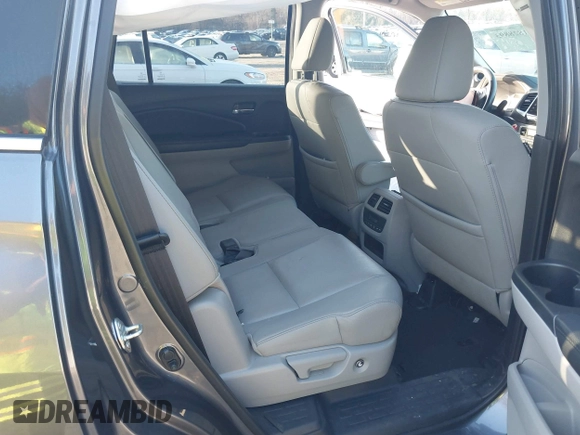 2017 Honda Pilot EX-L z VIN 5FNYF6H70HB069712, wystawiony jako IAAI lot #41828893 z przebiegiem 70 061 mil mil oraz . Historia ofert i sprzedaży dostępna na DreamBid. Obrazek 8.