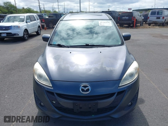 2012 Mazda 5 Grand Touring with VIN JM1CW2DL0C0139982, listed as a IAAI auction lot 42703430 with 129,763 mi miles and . Bid and sale history available at DreamBid. Image 6.