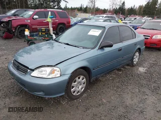 2000 Honda Civic LX with VIN 1HGEJ6677YL000793, listed as a IAAI auction lot 41889317 with 184,766 mi miles. Bid and sale history available at carsss.com. Image 2.