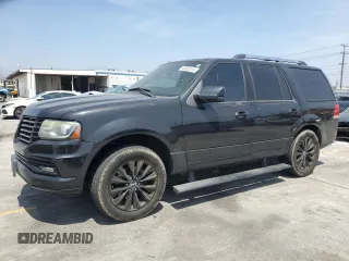 2015 Lincoln Navigator with VIN 5LMJJ2HT3FEJ01260, listed as a Copart auction lot 60092615 with 151,067 mi miles and Salvage title. Bid and sale history available at DreamBid. Image 1.