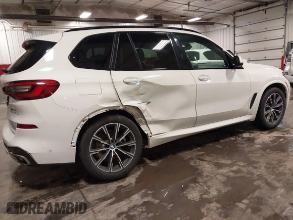 2020 BMW X5 xDrive40i with VIN 5UXCR6C01LLL66648, listed as a IAAI auction lot 42372631 with 59,770 mi miles and . Bid and sale history available at DreamBid. Image 4.