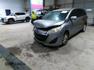 2013 Mazda 5 Sport with VIN JM1CW2BL5D0156684, listed as a IAAI auction lot 41966696 with 121,654 mi miles and . Bid and sale history available at DreamBid. Image 18.
