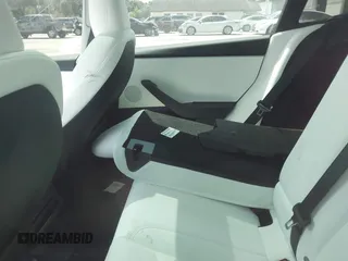 2024 Tesla Model 3 z VIN 5YJ3E1EAXRF864719, wystawiony jako IAAI lot #42129944 z przebiegiem 3 776 mil mil oraz . Historia ofert i sprzedaży dostępna na DreamBid. Obrazek 8.