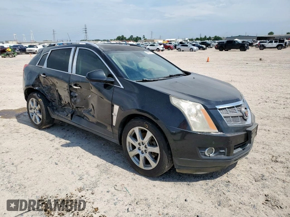 2012 Cadillac SRX Premium Collection z VIN 3GYFNCE39CS526425, wystawiony jako Copart lot #60557615 z przebiegiem 161 217 mil mil oraz Szkoda całkowita • Salvage title. Historia ofert i sprzedaży dostępna na DreamBid. Obrazek 4.