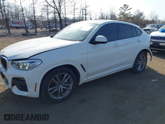 2021 BMW X4 xDrive30i z VIN 5UX2V1C01M9F26524, wystawiony jako IAAI lot #41805153 z przebiegiem 40 353 mil mil oraz . Historia ofert i sprzedaży dostępna na DreamBid. Obrazek 2.
