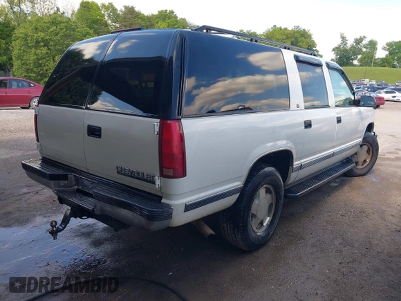 1997 Chevrolet Suburban with VIN 3GNFK16R2VG141730, listed as a IAAI auction lot 42208327 with 158,448 mi miles and . Bid and sale history available at DreamBid. Image 4.