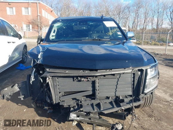 2019 Chevrolet Suburban Premier with VIN 1GNSKJKCXKR111502, listed as a IAAI auction lot 41075435 with 134,555 mi miles and . Bid and sale history available at DreamBid. Image 12.