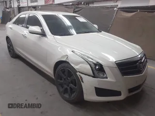 2014 Cadillac ATS Standard RWD with VIN 1G6AA5RXXE0107761, listed as a IAAI auction lot 42180007 with 144,569 mi miles and . Bid and sale history available at DreamBid. Image 1.