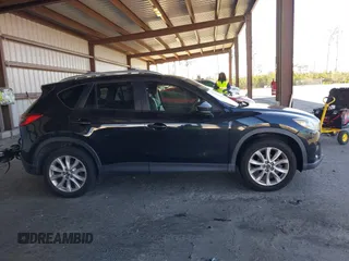 2013 Mazda CX-5 Grand Touring with VIN JM3KE2DE4D0127827, listed as a IAAI auction lot 41817214 with 108,295 mi miles. Bid and sale history available at carsss.com. Image 13.