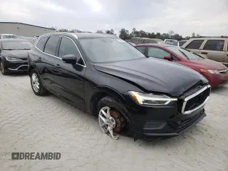 2018 Volvo XC60 Momentum with VIN LYV102RK1JB073418, listed as a Copart auction lot 73763614 with 64,692 mi miles and Salvage Title. Bid and sale history available at DreamBid. Image 4.
