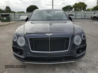 2019 Bentley Bentayga V8 z VIN SJAAM2ZV6KC025300, wystawiony jako Copart lot #81313854 z przebiegiem 2 982 mil mil oraz Szkoda całkowita • Salvage title. Historia ofert i sprzedaży dostępna na DreamBid. Obrazek 5.