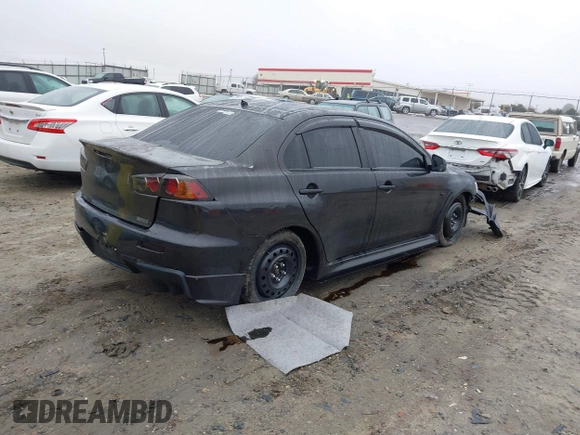 2010 Mitsubishi Lancer Evolution GSR with VIN JA32W8FV1AU012725, listed as a IAAI auction lot 41542629 with 124,347 mi miles and . Bid and sale history available at DreamBid. Image 4.
