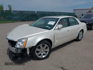 2011 Cadillac DTS Platinum Collection z VIN 1G6KP5ES8BU134913, wystawiony jako IAAI lot #42346157 z przebiegiem 60 608 mil mil oraz . Historia ofert i sprzedaży dostępna na DreamBid. Obrazek 2.