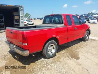2000 Ford F-150 XL with VIN 1FTZX1724YNA42041, listed as a IAAI auction lot 42577102 with Not provided miles and . Bid and sale history available at DreamBid. Image 4.