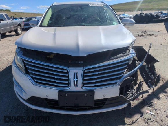 2015 Lincoln MKC z VIN 5LMTJ2AH7FUJ26375, wystawiony jako Copart lot #57830425 z przebiegiem 96 169 mil mil oraz Szkoda całkowita • Salvage title. Historia ofert i sprzedaży dostępna na DreamBid. Obrazek 5.