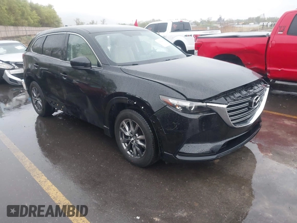 2016 Mazda CX-9 Touring with VIN JM3TCBCY5G0101490, listed as a IAAI auction lot 42062846 with 85,352 mi miles and . Bid and sale history available at DreamBid. Image 1.