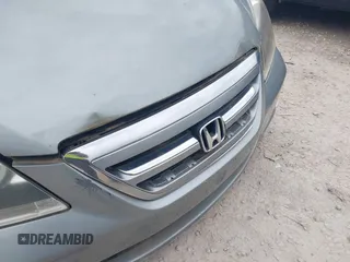 2005 Honda Odyssey EX-L z VIN 5FNRL38775B117598, wystawiony jako IAAI lot #42276239 z przebiegiem 184 134 mil mil oraz . Historia ofert i sprzedaży dostępna na DreamBid. Obrazek 12.