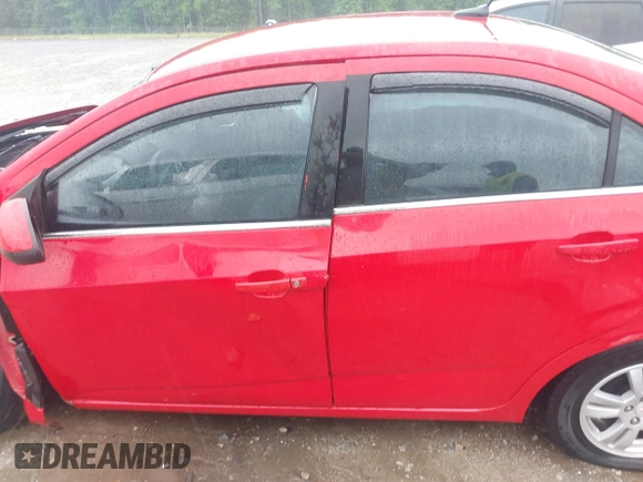 2012 Chevrolet Sonic LT with VIN 1G1JC5SH4C4160545, listed as a IAAI auction lot 42355602 with 181,390 mi miles and . Bid and sale history available at DreamBid. Image 14.