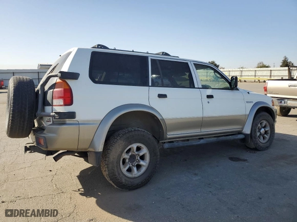 1997 Mitsubishi Montero Sport LS with VIN JA4MT31P8VP005560, listed as a Copart auction lot 75928354 with 187136 miles and Salvage Title. Bid and sale history available at carsss.com. Image 3.