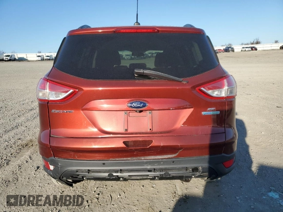 2014 Ford Escape SE z VIN 1FMCU0GX2EUB60901, wystawiony jako Copart lot #48258755 z przebiegiem 129 925 mil mil oraz Szkoda całkowita • Salvage title. Historia ofert i sprzedaży dostępna na DreamBid. Obrazek 6.