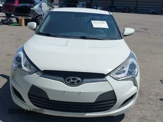 2016 Hyundai Veloster with VIN KMHTC6AD3GU270895, listed as a IAAI auction lot 42139765 with 138,884 mi miles. Bid and sale history available at carsss.com. Image 6.