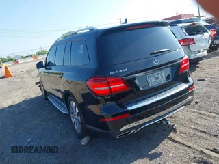 2018 Mercedes-Benz GLS 450 with VIN 4JGDF6EE1JB075332, listed as a IAAI auction lot 42120007 with 111,559 mi miles and . Bid and sale history available at DreamBid. Image 3.