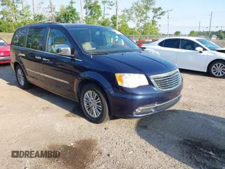 2013 Chrysler Town & Country Touring-L with VIN 2C4RC1CG4DR571693, listed as a IAAI auction lot 42014430 with 79,449 mi miles. Bid and sale history available at carsss.com. Image 1.