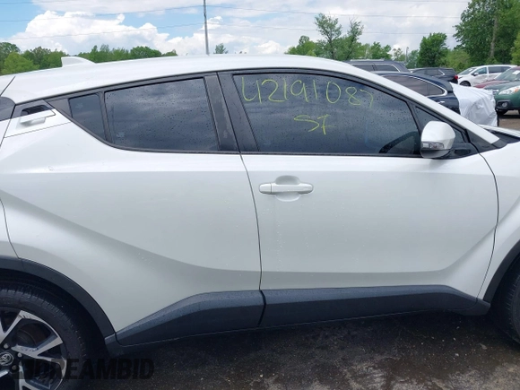 2019 Toyota C-HR XLE z VIN NMTKHMBX9KR095031, wystawiony jako IAAI lot #42191087 z przebiegiem 102 167 mil mil oraz . Historia ofert i sprzedaży dostępna na DreamBid. Obrazek 14.