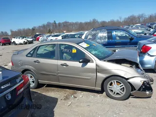 2003 Ford Focus SE with VIN 1FAFP34P03W240199, listed as a IAAI auction lot 41757940 with 91,852 mi miles and . Bid and sale history available at carsss.com. Image 13.