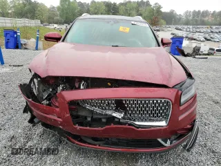 2019 Lincoln Nautilus Reserve z VIN 2LMPJ6L9XKBL57034, wystawiony jako Copart lot #51652415 z przebiegiem 51 302 mil mil oraz Szkoda całkowita • Salvage title. Historia ofert i sprzedaży dostępna na DreamBid. Obrazek 5.