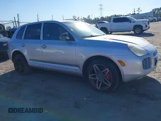 2006 Porsche Cayenne Turbo with VIN WP1AC29P56LA92817, listed as a IAAI auction lot 41881124 with 286,832 mi miles and . Bid and sale history available at DreamBid. Image 1.