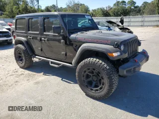2023 Jeep Wrangler Rubicon z VIN 1C4HJXFN2PW617435, wystawiony jako Copart lot #75409114 z przebiegiem 12 185 mil mil oraz Szkoda całkowita • Salvage title. Historia ofert i sprzedaży dostępna na DreamBid. Obrazek 4.